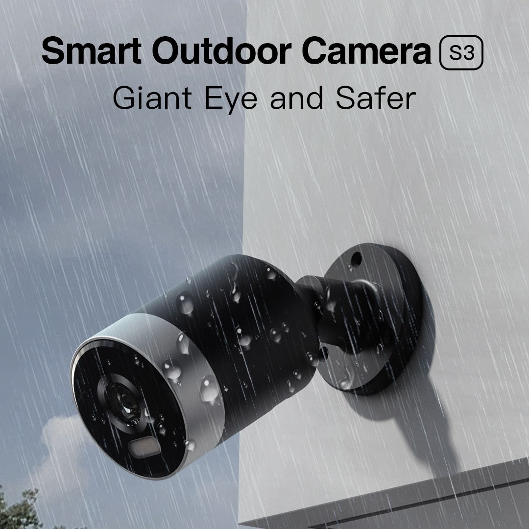 Smart outdoor camera with raindrops on a metallic surface